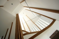 Woven Nest London home stairs view up