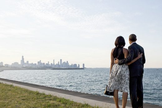 President Barack Obama and First Lady Michelle Obama look out at the city skyline