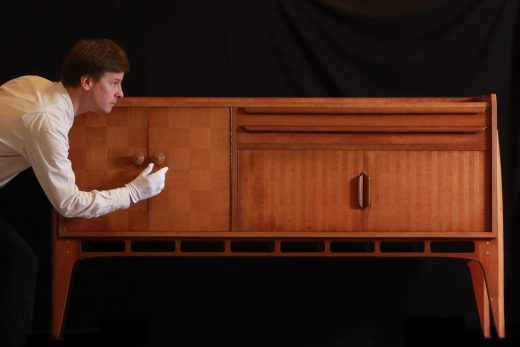 Senior Curator Stephen Jackson with the Allegro sideboard