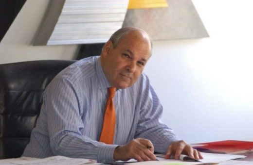 Howard Elkus at his desk