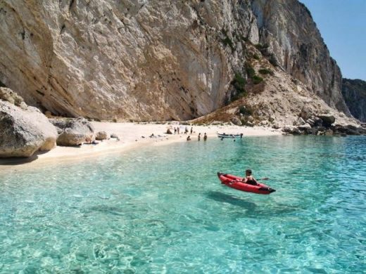 Vacation in Corfu Island beach holiday sea canoe