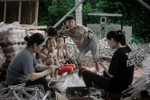 Local children join the construction work China