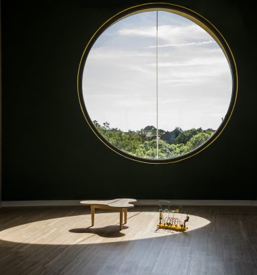 Vinh nursery interior circular window