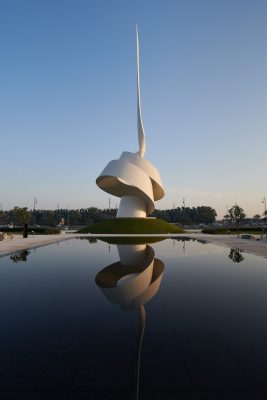 The Scroll Sculpture in Sharjah pool reflection