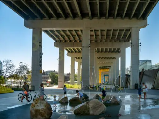 Playing in The Bentway water feature Toronto