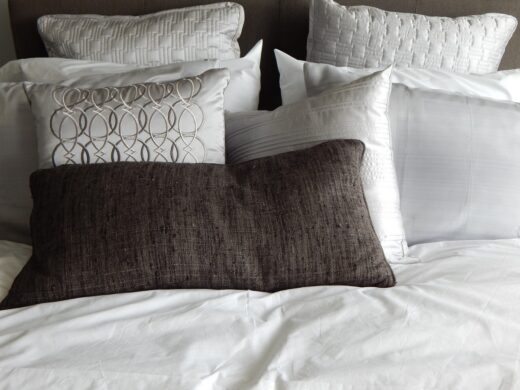 Make your home feel cozy pillows on bed