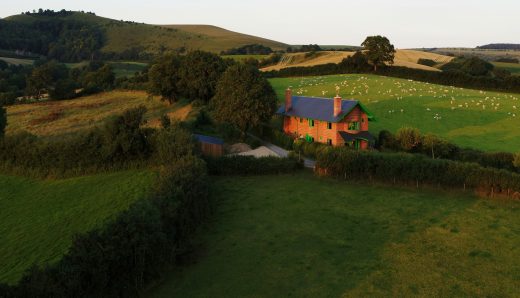 The Red House in Dorset landscape