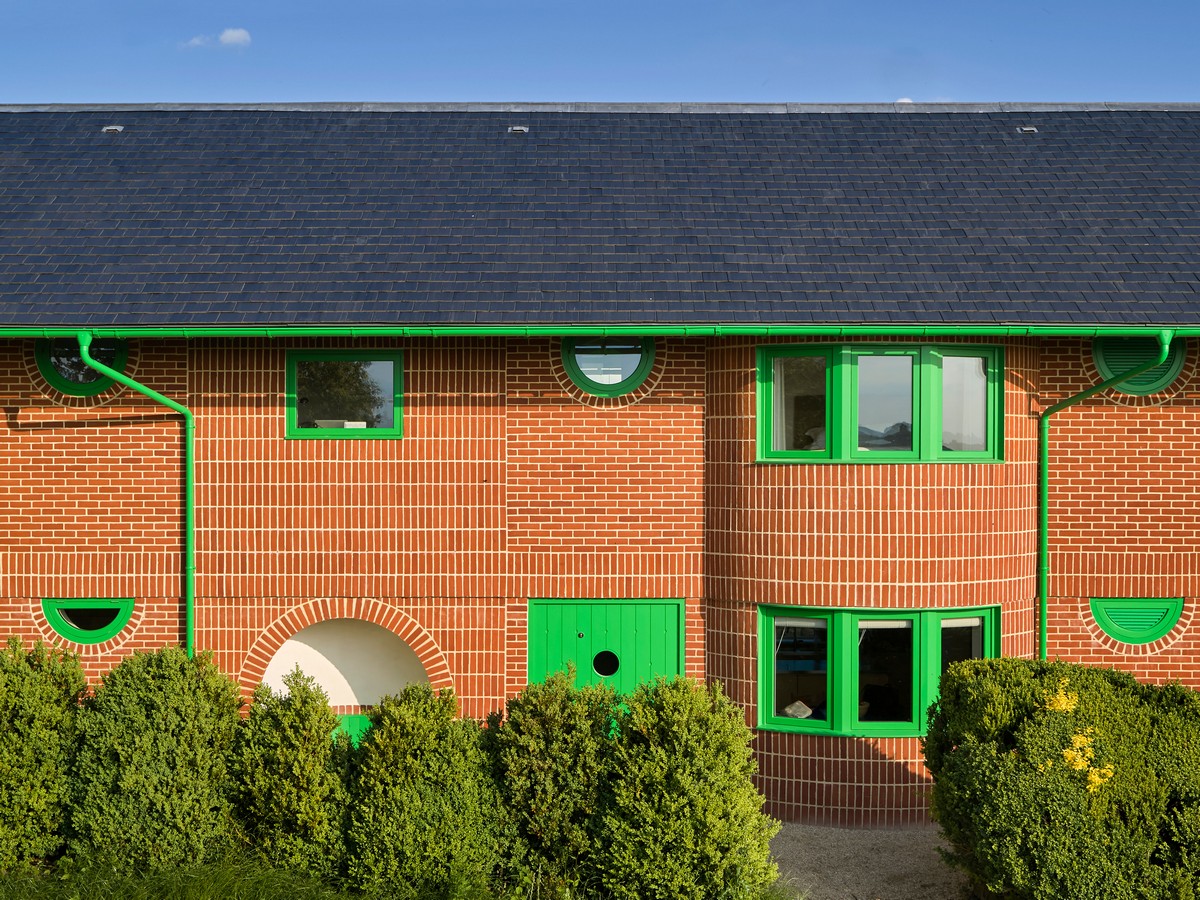 The Red House in Dorset green windows