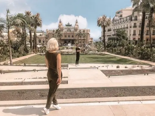 People making a photo in front of famous Monte Carlo Casino - Showcasing iconic casino buildings from around the world