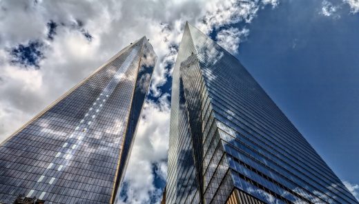 skysraper buildings glass facades - guide to researching topics for college essays