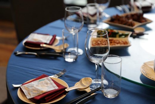 circular wood dining table design plates glasses