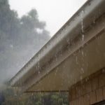 Flat roof vs pitched home gutter rain