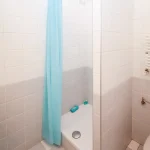 Is a wet room cheaper than a shower
