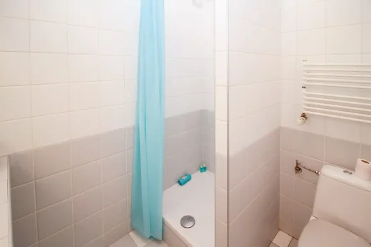 Is a wet room cheaper than a shower