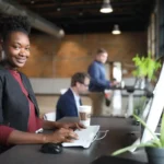 Interior glass walls desk office woman