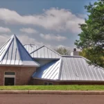 Replacing vs refurbishing flat metal roofs
