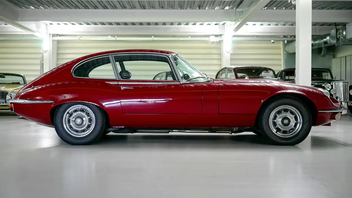 Dark red Jaguar E-Type sports car