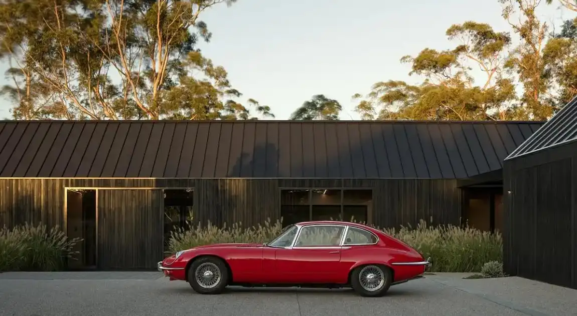 New South Wales house Australia red Jaguar E-Type sports car