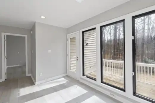 A modern interior with wide-plank wood-look flooring