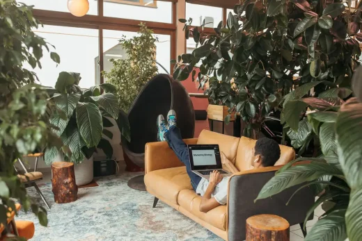 Home garden office work space design - laptop on sofa