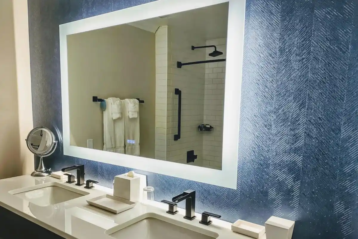 What type of mirror is best for humid bathrooms