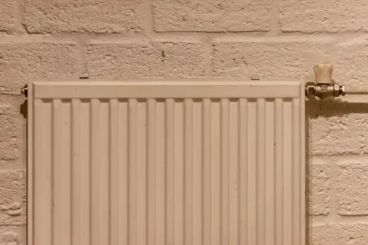 home radiator white painted block wall