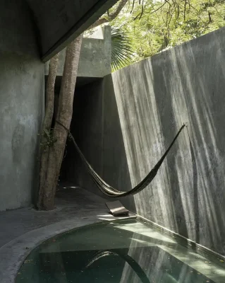 The Green Brutalist Grotto Yucatán Mexico yard